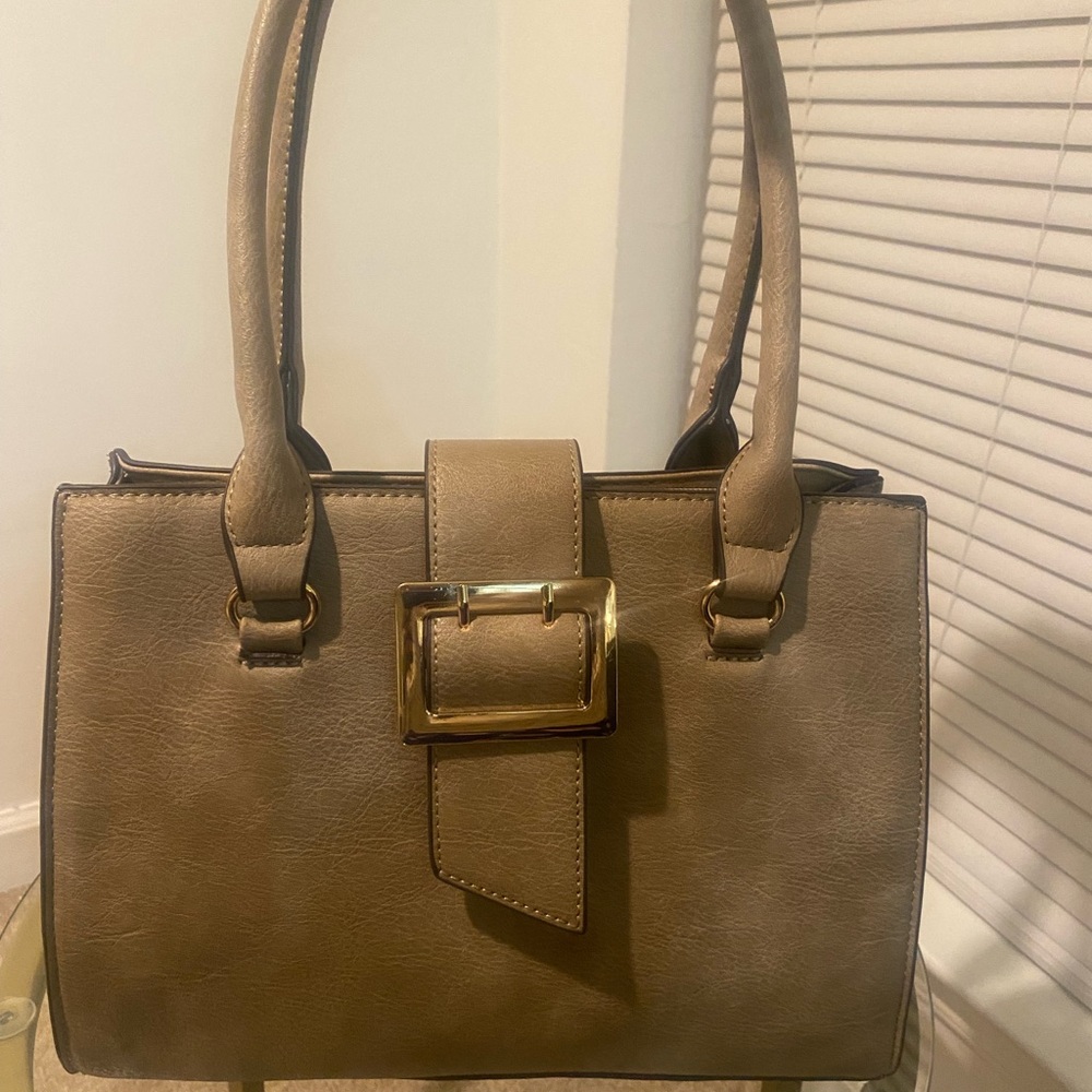 Elegant Beige Handbag with Gold Buckle Closure